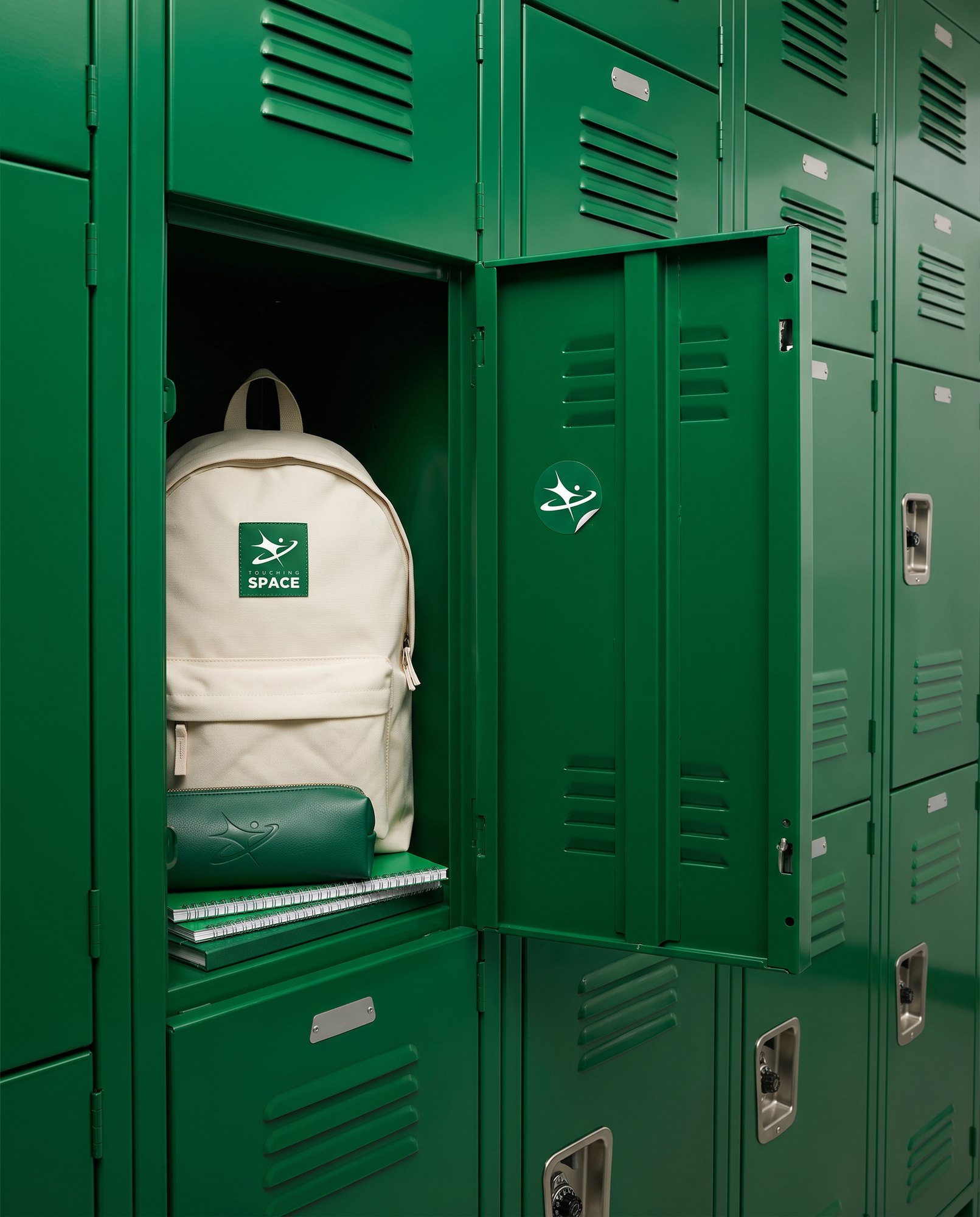 Green lockers with a branded backpack